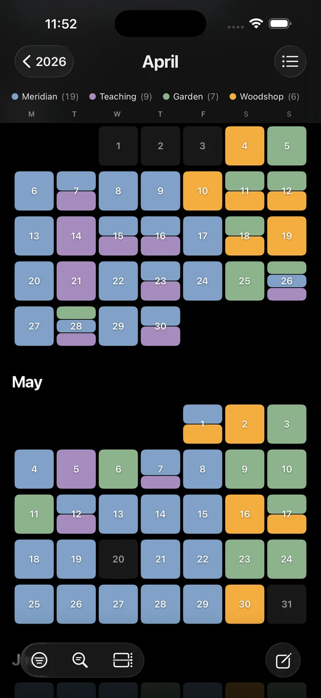The Almanac on iPhone. Months as a grid of days, colored by channel.