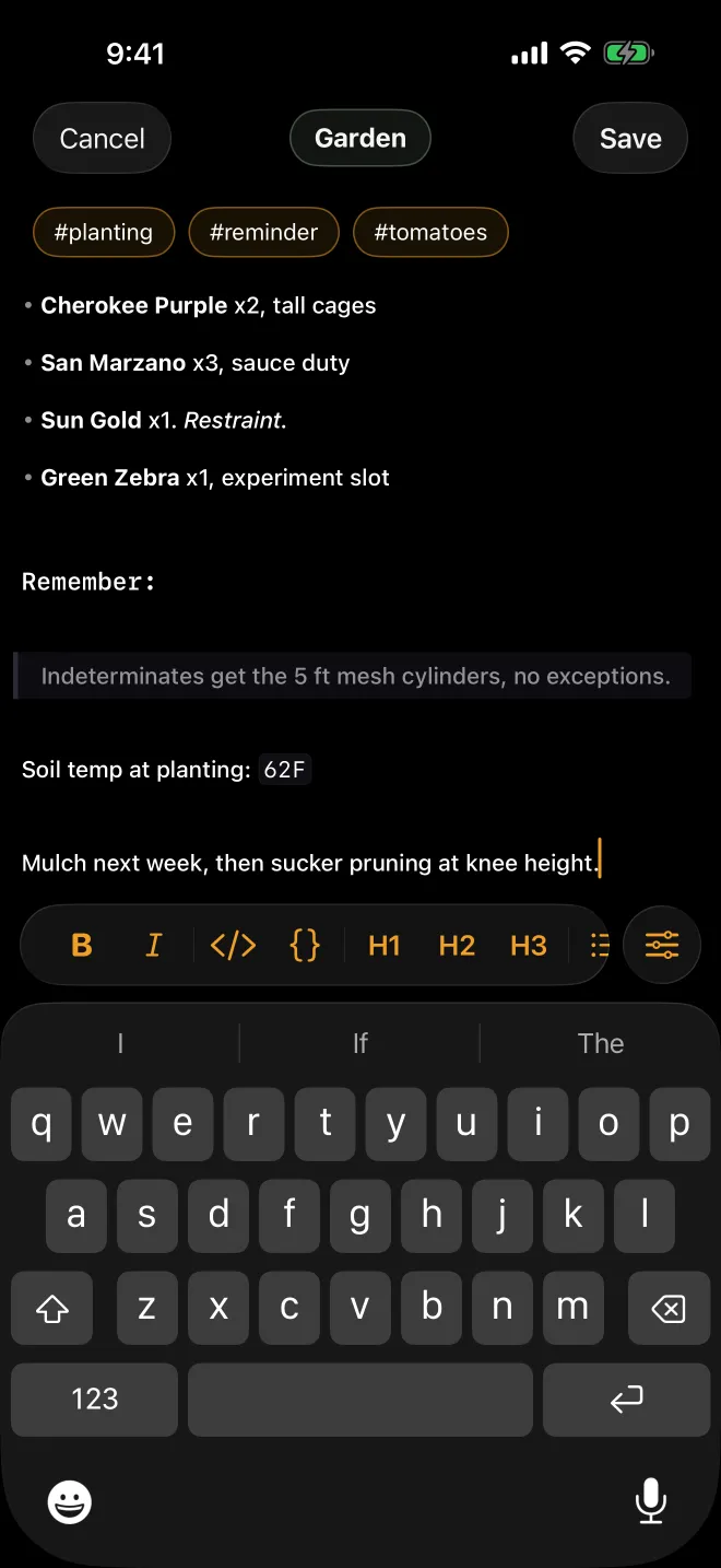 The iPhone composer. A formatted entry about planting a tomato bed, tags at the top, formatting bar above the keyboard.