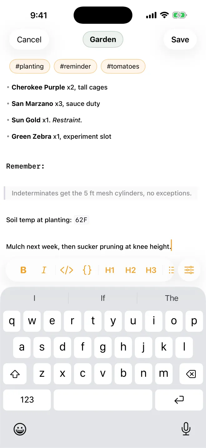 The iPhone composer. A formatted entry about planting a tomato bed, tags at the top, formatting bar above the keyboard.